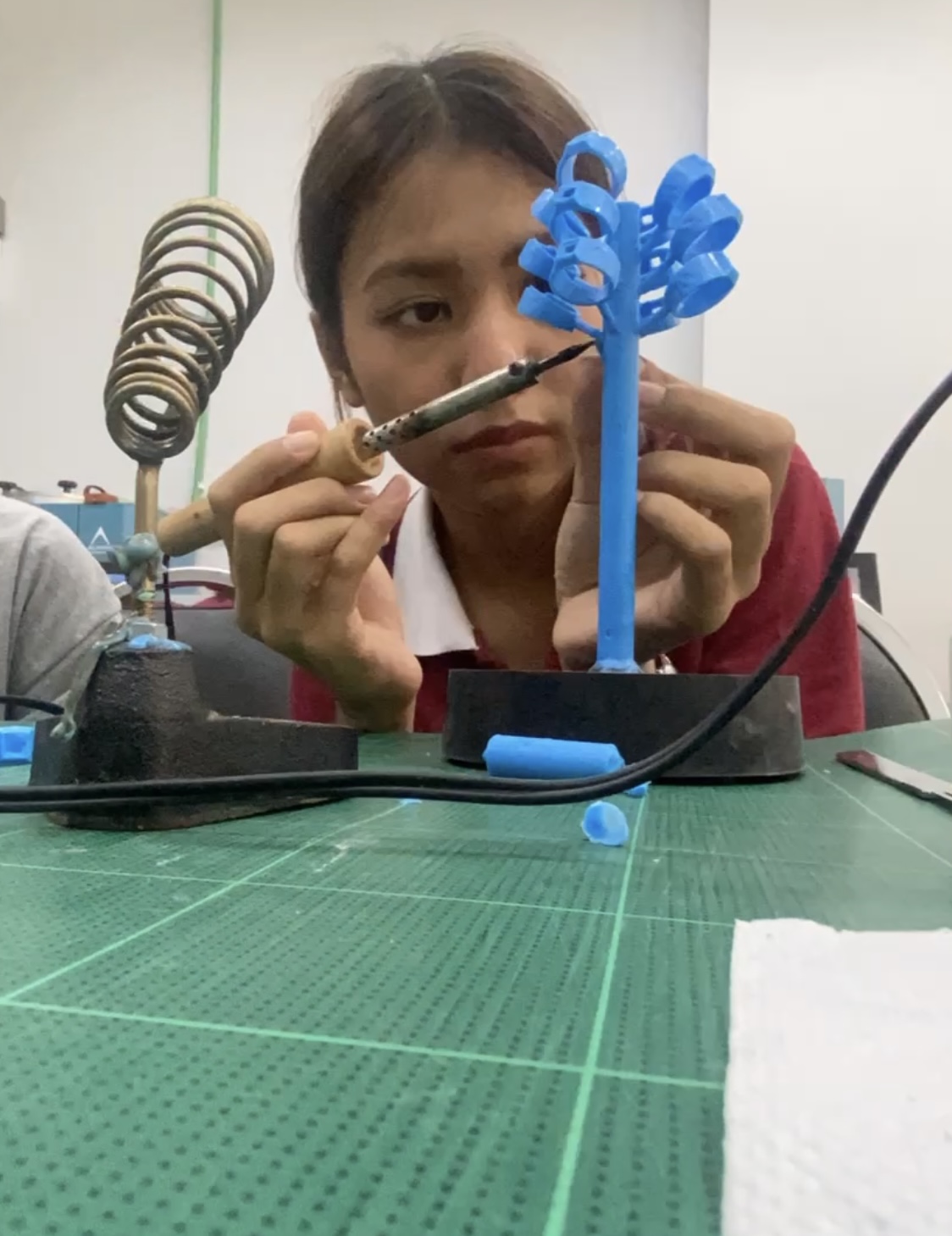 Wax tree assembly at a workbench