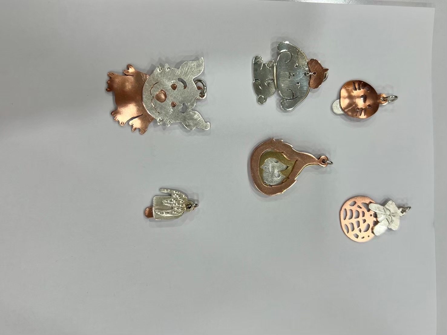 Finished charm pieces
