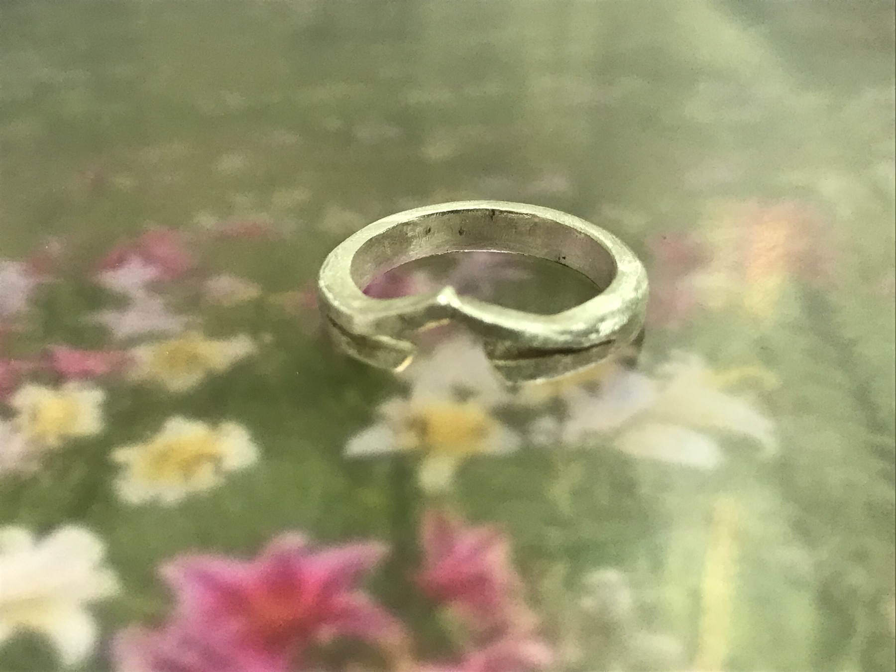 Ring on floral background